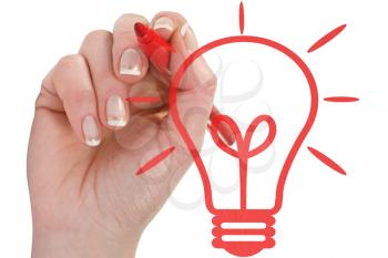 Royalty Free Photo of a Hand Drawing a Light Bulb