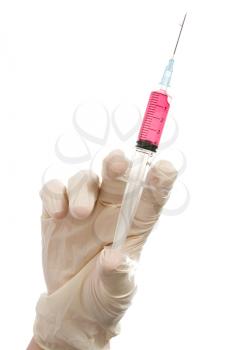 Royalty Free Photo of a Person Holding a Syringe
