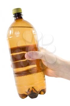 Royalty Free Photo of a Person Holding a Plastic Bottle