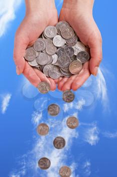 Royalty Free Photo of a Person Holding Coins
