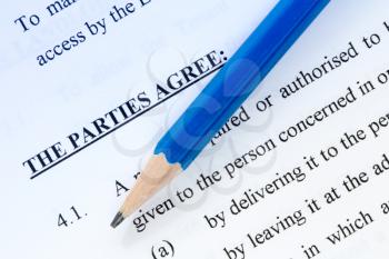 Pencil on the agreement between landlord and tenant
