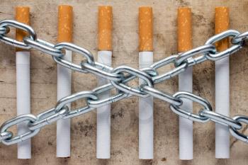 Chained cigarettes. Conceptual image for stop smoking