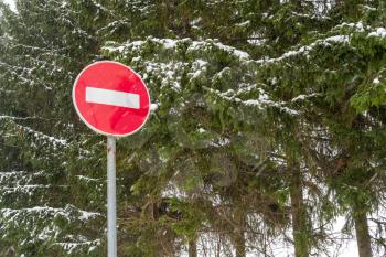 Stop street sign in winter season. Hazard drive carefully in the weather season