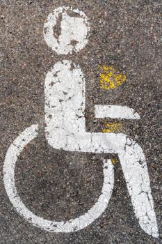 Disabled Person Wheelchair Sign Traffic Symbol On Asphalt Road