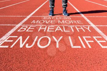 Health and motivation concept.Runner feet on the  starting line for new life