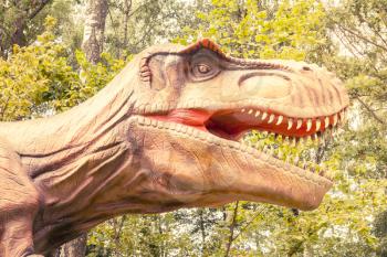  Close-up head of Tyrannosaurus rex with open mouth