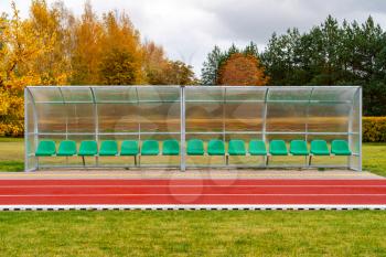 Green chair for spare team/ spare persons near running track