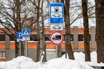 Parking for electric cars , winter urban scene