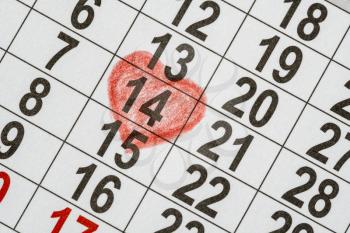 Calendar with the date of February 14 Valentine's day with red heart mark