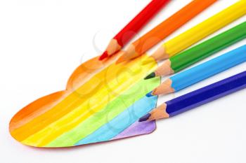 A heart is drawn with pencils in the colors of the LGBT flag. Support for the LGBT movement, for the rights of gays, lesbians. Love, human rights, community tolerance.