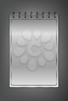Royalty Free Clipart Image of a Metal Notepad