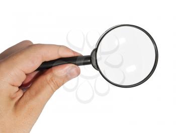 Magnifying glass in the hand