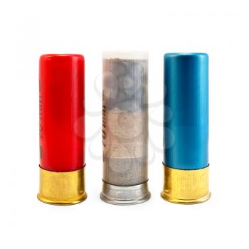 Three ammunitions for the shotgun, red, blue and white isolated on white background