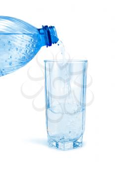 Mineral water in a glasses and bottle isolated on white background