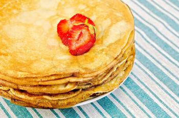 Royalty Free Photo of Pancakes and Berries on a Table