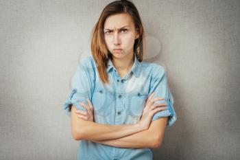 angry woman. isolated on gray background