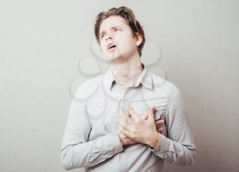 A young man suffering from heart pain