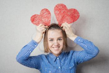 young girl with hearts