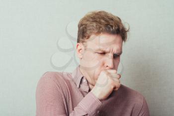 man fell ill and coughing