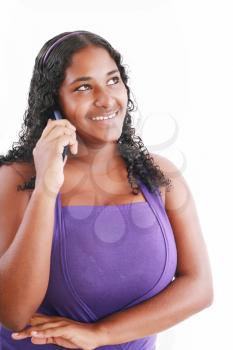 happy african woman speaking at her telephone (isolated on white) 
