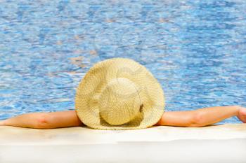 Woman in hat relaxing on holiday