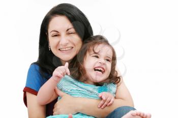 Closeup of happy young mother having fun with her daughter