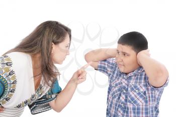 Mother scolding her son with pointed finger 