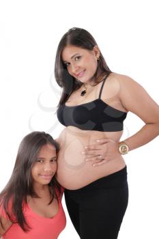 Beautiful pregnant woman with her daughter