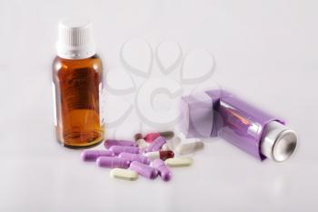 Royalty Free Photo of an Inhaler, Pills and Jarabe