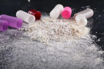 Royalty Free Photo of Open Pills and Powder