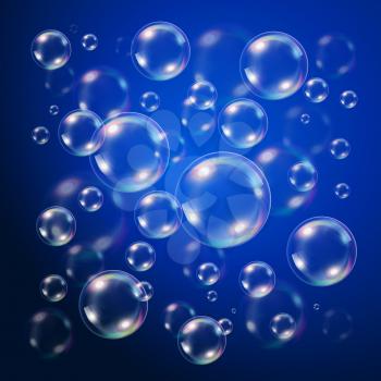 Transparent bubbles over dark blue background