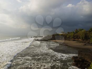 Tanah Lot sunset in stormy weather, Bali, Indonesia