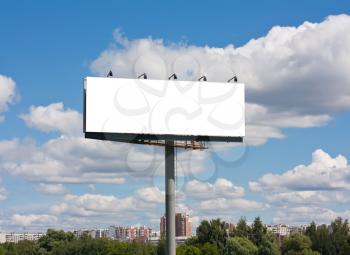 Royalty Free Photo of a Blank Billboard with a City Background