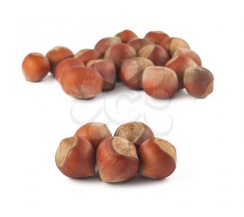 Royalty Free Photo of Two Groups of Hazelnuts