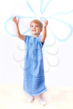 Royalty Free Photo of a Little Girl in a Blue Dress