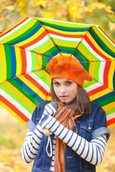 Royalty Free Photo of a Woman Holding an Umbrella
