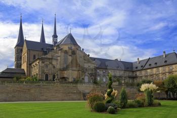 Kloster Michelsberg (Michaelsberg) cathedral and garden in Bamburg, Germany with blue sky

