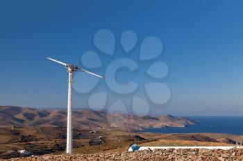 Rotating windmill on Greece island
