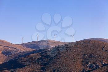 Rotating windmill on Greece island, instagram toning
