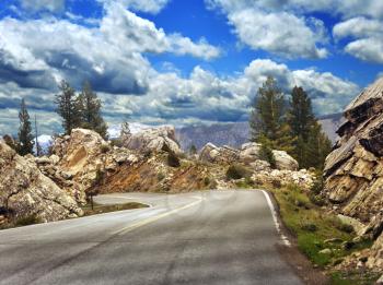 Royalty Free Photo of an Asphalt Road in a Mountain