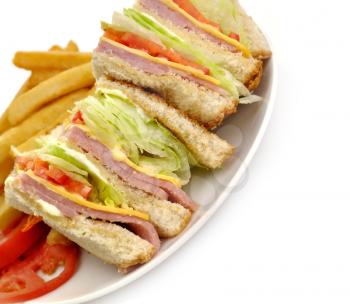 Royalty Free Photo of Club Sandwiches and Fries
