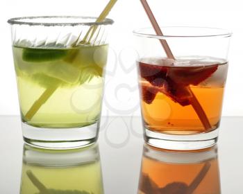 colorful fruit cocktails with ice cubes