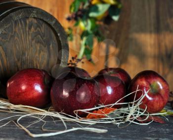 Red apples and wooden basket