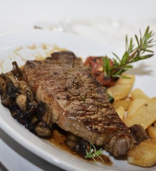 Grilled Steak With Mushrooms And Potatoes