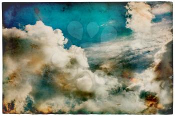 Grunge old paper with cloudy sky, retro style background