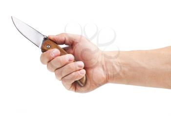 Knife in hand, isolated on white background