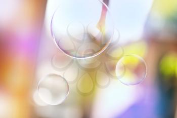 Soap bubbles on summer background