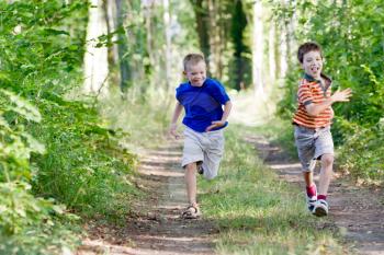 Young chidren running in nature