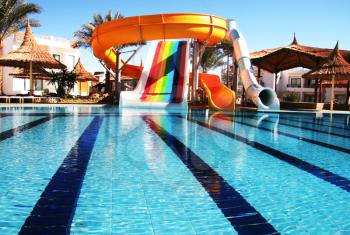Royalty Free Photo of a Pool and Water Slides