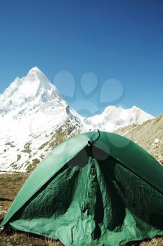 Royalty Free Photo of a Tent in the Mountains